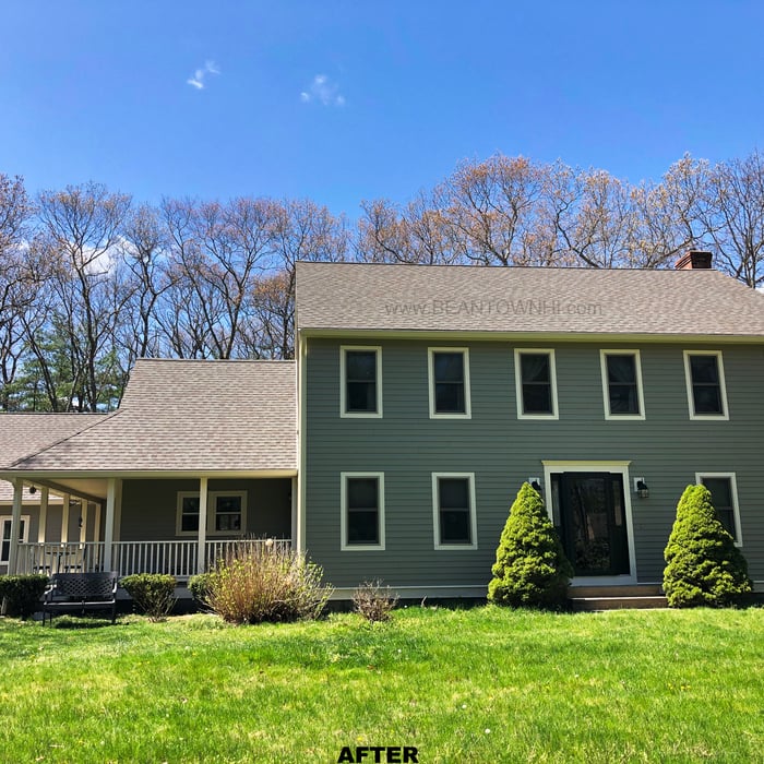 Stripped existing siding and replaced any rotted wood. Installed Henry Blueskin water barrier underlayment. Next we installed James Hardie fiber cement smooth plank siding in Monterey Taupe. New homeowner painted PVC rake boards and fascia were also installed along with new gutters in Eggshell.