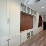 Floor to ceiling cabinet, and entertainment center.
