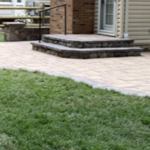 After from back yard-Patio with steps and railing