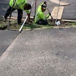 Boring under a driveway for a sprinkler install
