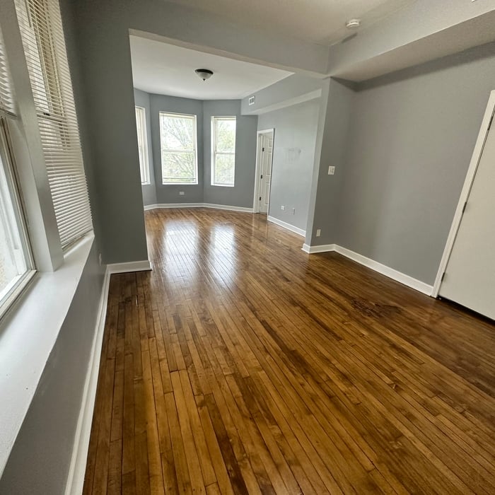 Removed old flooring with asbestos tiles, the owner hired a floor refinisher to reveal this amazing floor from 1905.