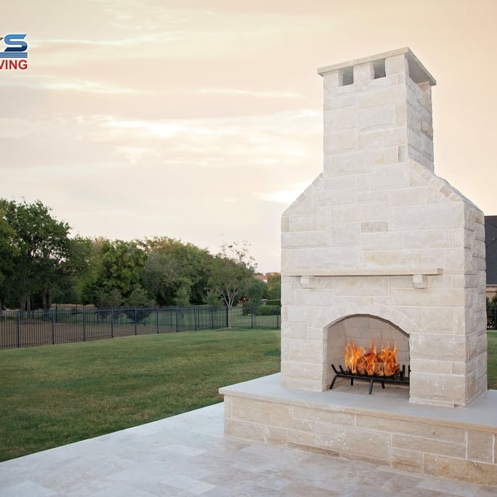 Oklahoma Stone Fireplace on a Travertine Overlay Patio.