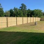 Stockade (board on board) privacy fence