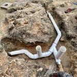 excavating, removing & replacing old lines