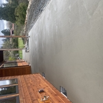 Concrete patio waiting to get hard enough to wash and expose aggregate.
