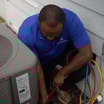 One of our techs working on a condensing unit.