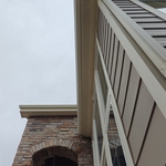 Seamless Gutter replaced, but downspout was re-used.