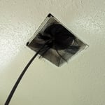 Cleaning the ductwork with a brush while the machine pulls the loose debris into the duct and then the filter.