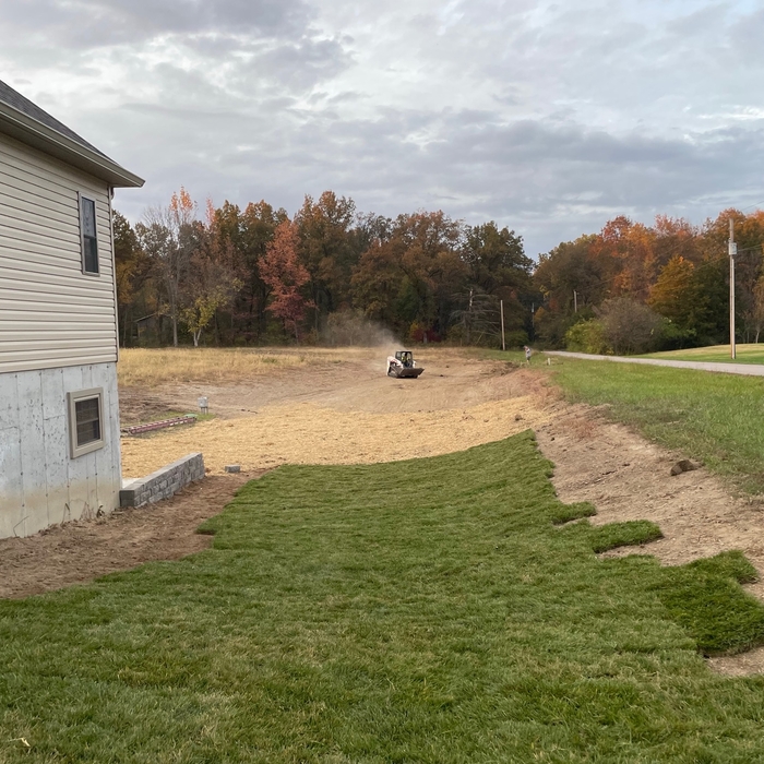 Grading excavation and retaining walls