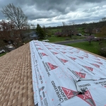 Our team immediately put on an emergency tarp to give the homeowner a little bit of protection and try to prevent further damage from element exposure.