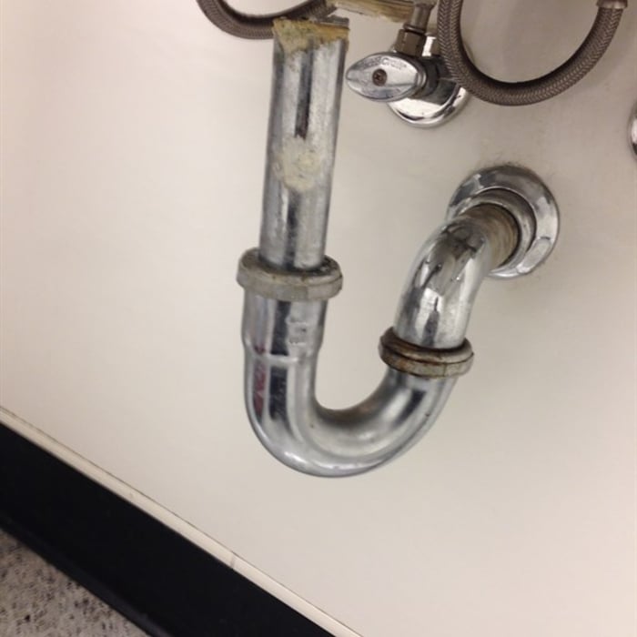 Broken p-trap and pop assembly