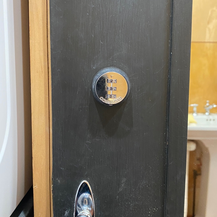 3 number security code lock installed on the cabinet door