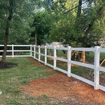 3 rail paddock in vinyl with mesh.