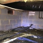 Open vents in the foundation walls allow outside air and moisture to infiltrate the crawl space, increasing the relative humidity and allowing mold spores to thrive inside.