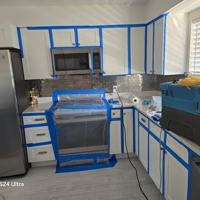 Cabinets taped off so mold cant enter