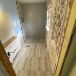 Completed shower wall tile and floor