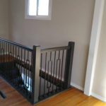 New railing for the new stairway that we cut and built to the lower floor.