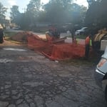 Sewer installation under road.