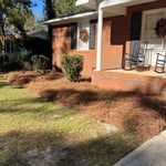 Re-straw flower beds