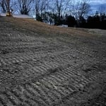 Driveway regravel & slope