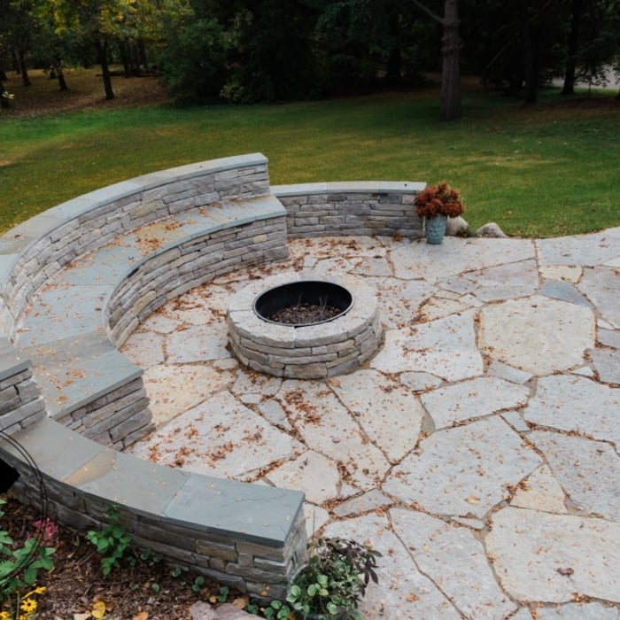 Mendota Heights Backyard Living Area Renovation. Outdoor fire-pit with sitting wall.