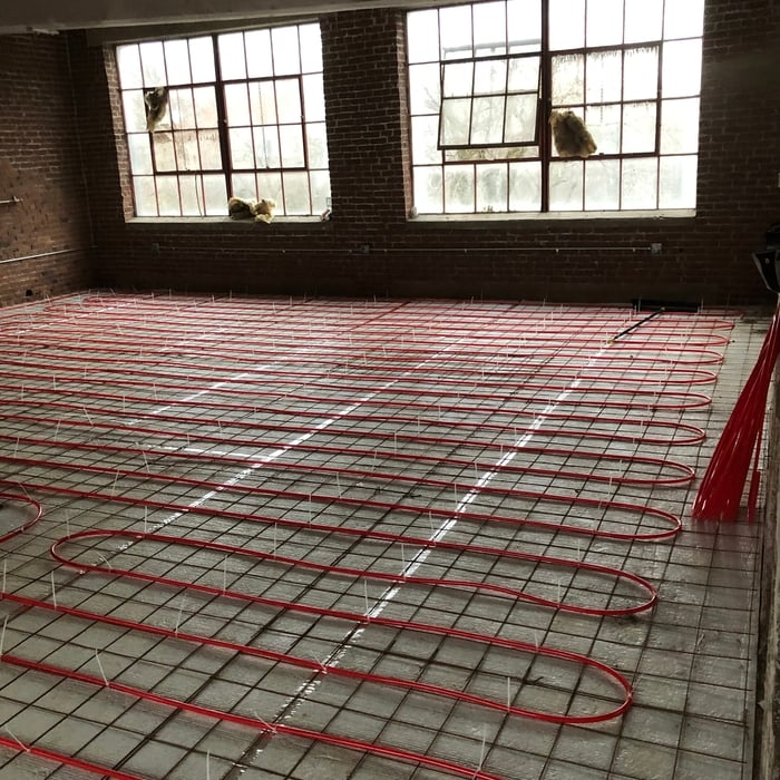 4 zones of radiant heat/ 1 zone of baseboard heat. This unit is also a tankless water heater.