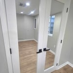 Basement Remodel: French Doors, Waterproof Luxury Vinyl, and newly installed Egress window to add a safe escape route and LIVABLE SPACE to the home.