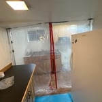 Containment being set to enter a decontamination chamber.
