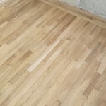 Staggered new red oak flooring into original flooring.