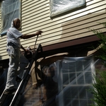 We spray siding. Monroeville