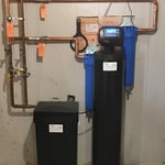 High efficiency water softener with sediment and carbon filtration to correct hard water, manganese and sediment build-up as well as chlorine taste & odor on this public water supply.