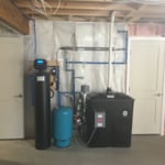 The water from this private well revealed high radon and iron in the lab water test. This system eliminated these water quality issues.