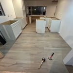 Putting down vinyl flooring