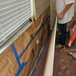 We put new insulation before installation of new drywall. This insulation for exterior walls tinfoil and paper barrier for cooling and heat.