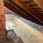 Insulated Storage deck with sturdy insulation retention dam around the perimeter.