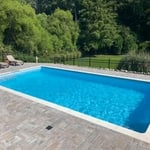 Custom Desjoyaux pool installed.
