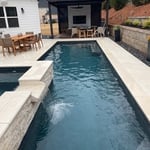 Custom Desjoyaux pool installed.