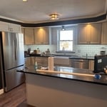 Replaced cabinets and countertops.