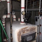 Boiler covered with Asbestos Mortar