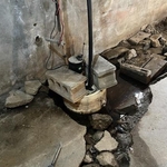 The homeowner's pre-existing sump pump that we replaced with our TripleSafe Sump Pump System.