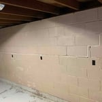 Before installation and during wall repair preparation.