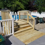 This pressure treated deck extension to the pool looked great and fit the owners budget.