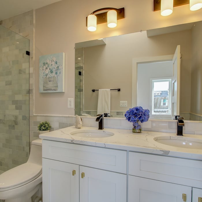 Bathroom remodeled With Double Sink, Standing Shower, Door Mirror & Flushing Toilet, Fairfax