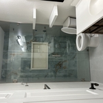 Remodeled guest bathroom with walk-in shower