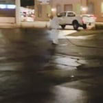 CSSI staff sealcoating parking lot