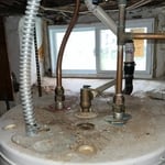 Here we can see the original heater with the seized water shut off valve