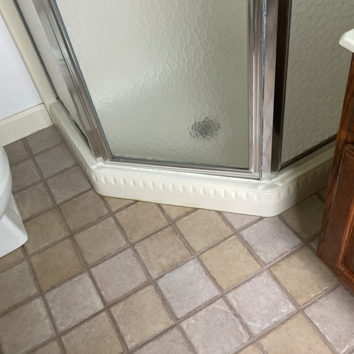 Previous shower surround.