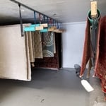 Cleaned rugs hanging in our dry room