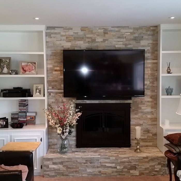 Built-in shelves and Fireplace install to update out=dated living room