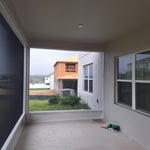 Screen walls to a covered lanai